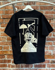 CAV EMPT WONDERLAND GRAPHIC TEE ‘BLACK’