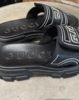 GUCCI AGURU TREK LEATHER SLIDES ‘BLACK’