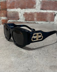 BALENCIAGA BLACK OVAL SUNGLASSES ‘BLACK/GOLD’