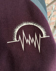 GU X UNDERCOVER KOSMIK NOISE VARSITY JACKET ‘BLACK/MAROON’