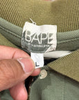 BAPE x KAWS COLLABORATION POLO ‘SAGE’