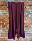 NEEDLES WIDE HD TRACK PANTS ‘MAROON/PURPLE’