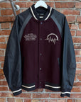 GU X UNDERCOVER KOSMIK NOISE VARSITY JACKET ‘BLACK/MAROON’
