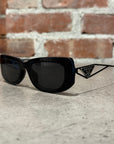 PRADA PR B15S TRIANGLE BADGE SUNGLASSES ‘BLACK’