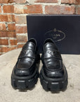 PRADA LEATHER MONOLITH LOAFERS ‘BLACK’