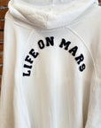 RAF SIMONS LIFE ON MARS DISTRESSED HOODIE ‘CREAM’