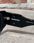BALENCIAGA BLACK OVAL SUNGLASSES ‘BLACK/GOLD’