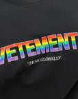 VETEMENTS AW21 THINK GLOBALLY RAINBOW TEE ‘BLACK’