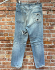 BALENCIAGA DOUBLE LAYERED DISTRESSED LOGO DENIM ‘BLUE/BLACK’