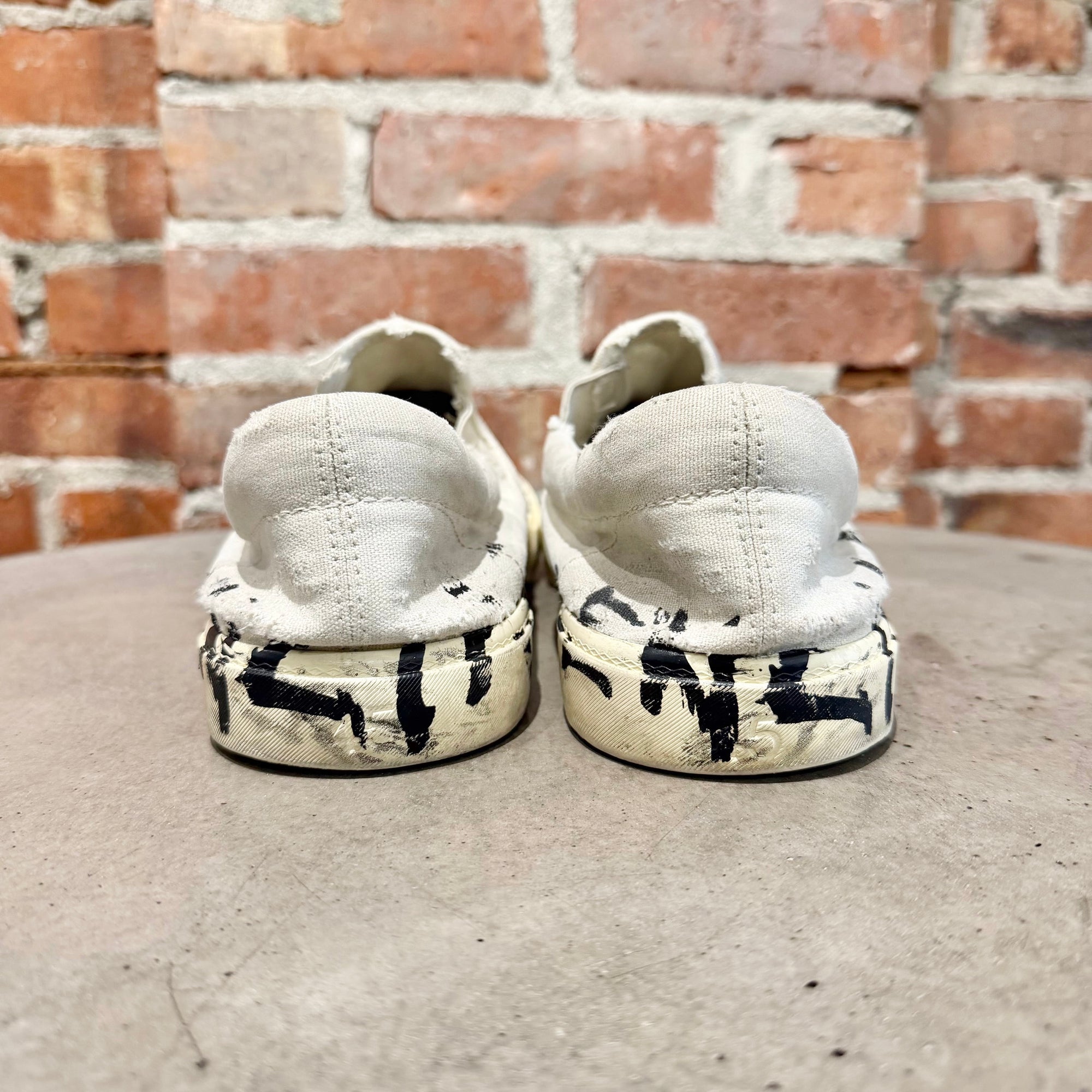 BALENCIAGA PARIS GRAFFITI SLIP ON SNEAKERS ‘WHITE’