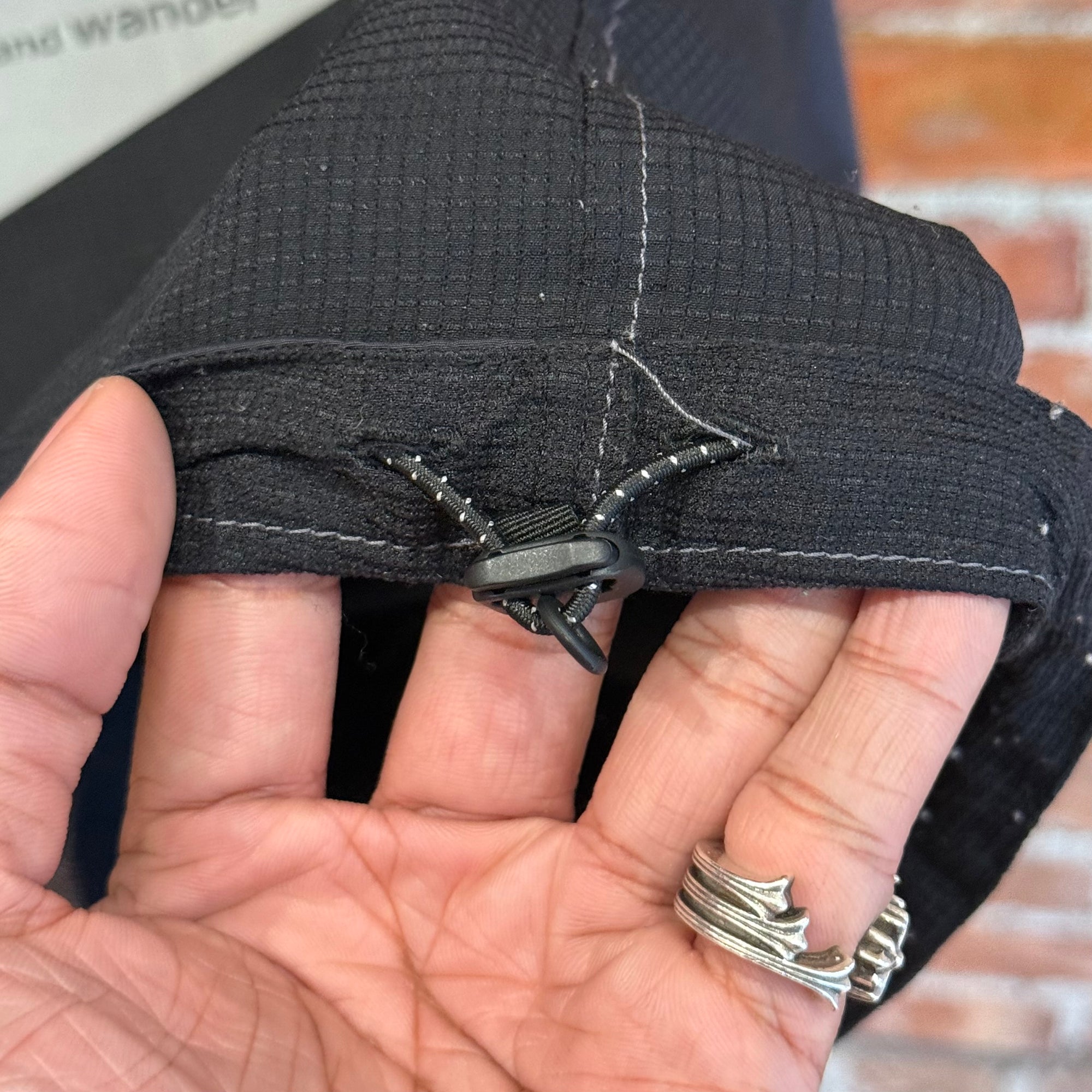 AND WANDER LIGHT POLYESTER PULLOVER ‘BLACK’