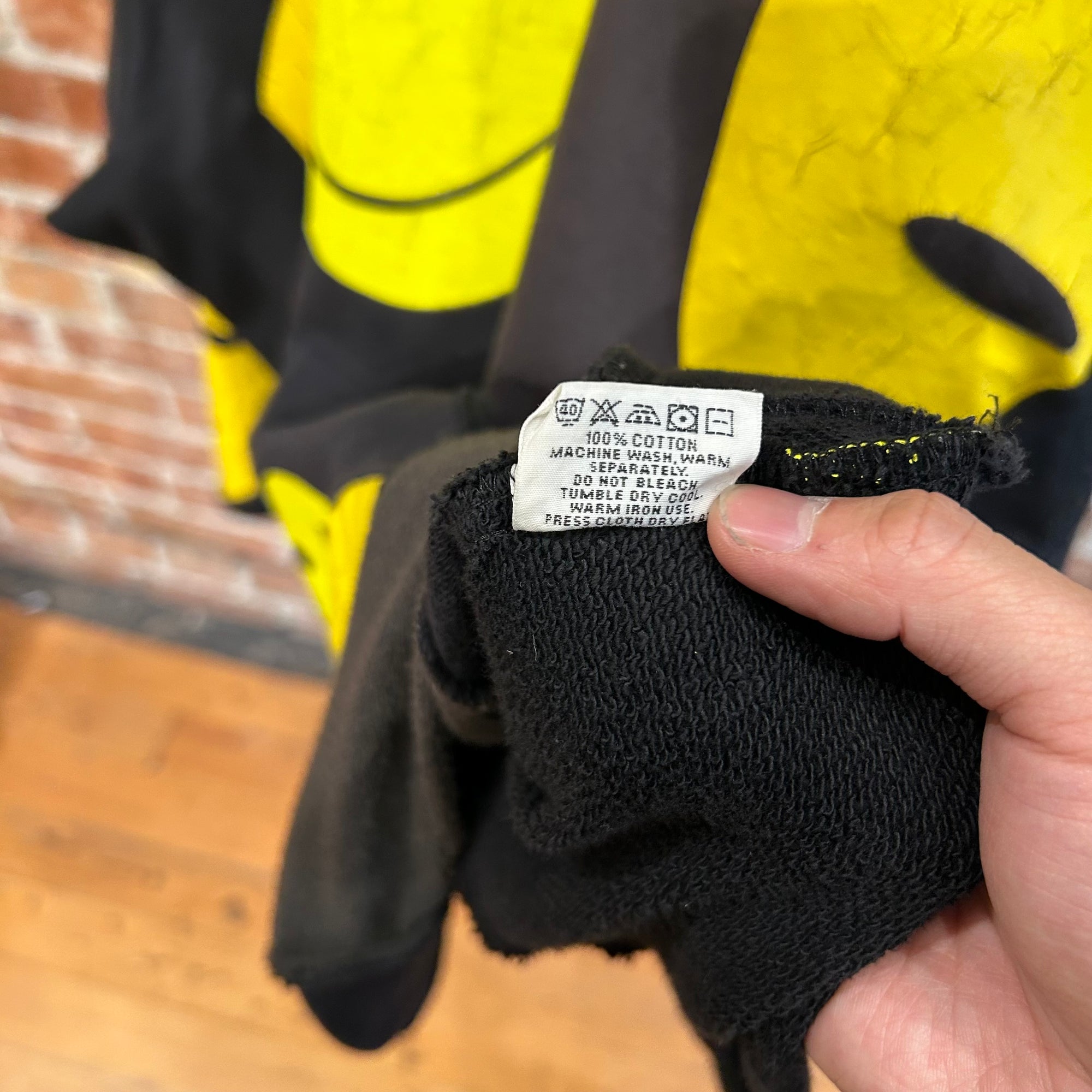 KAPITAL RECONSTRUCTED PATCHWORK SMILEY HOODIE ‘BLACK/YELLOW’