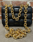 BOTTEGA VENETA CHAIN PADDED CASSETTE BAG ‘BLACK/GOLD’