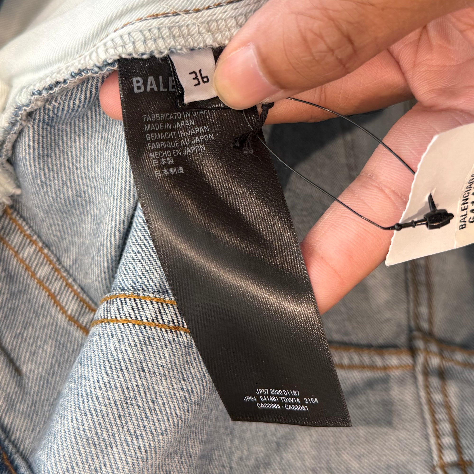 BALENCIAGA DOUBLE LAYERED DISTRESSED LOGO DENIM ‘BLUE/BLACK’