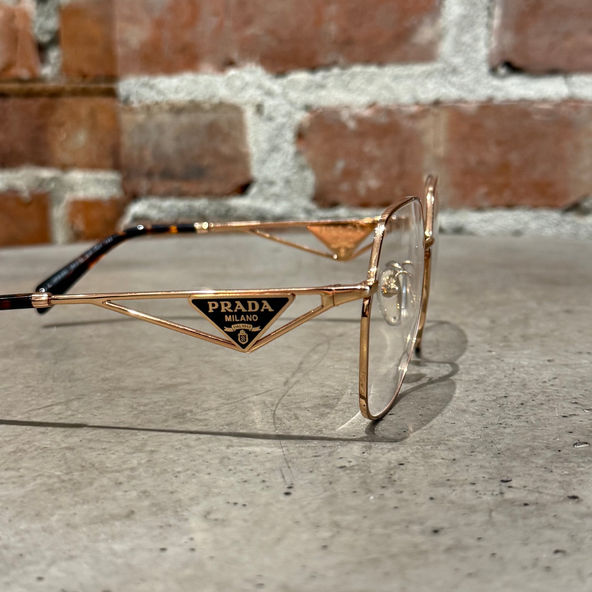 PRADA 59ZV CLEAR FRAME SUNGLASSES ‘WHITEGOLD’