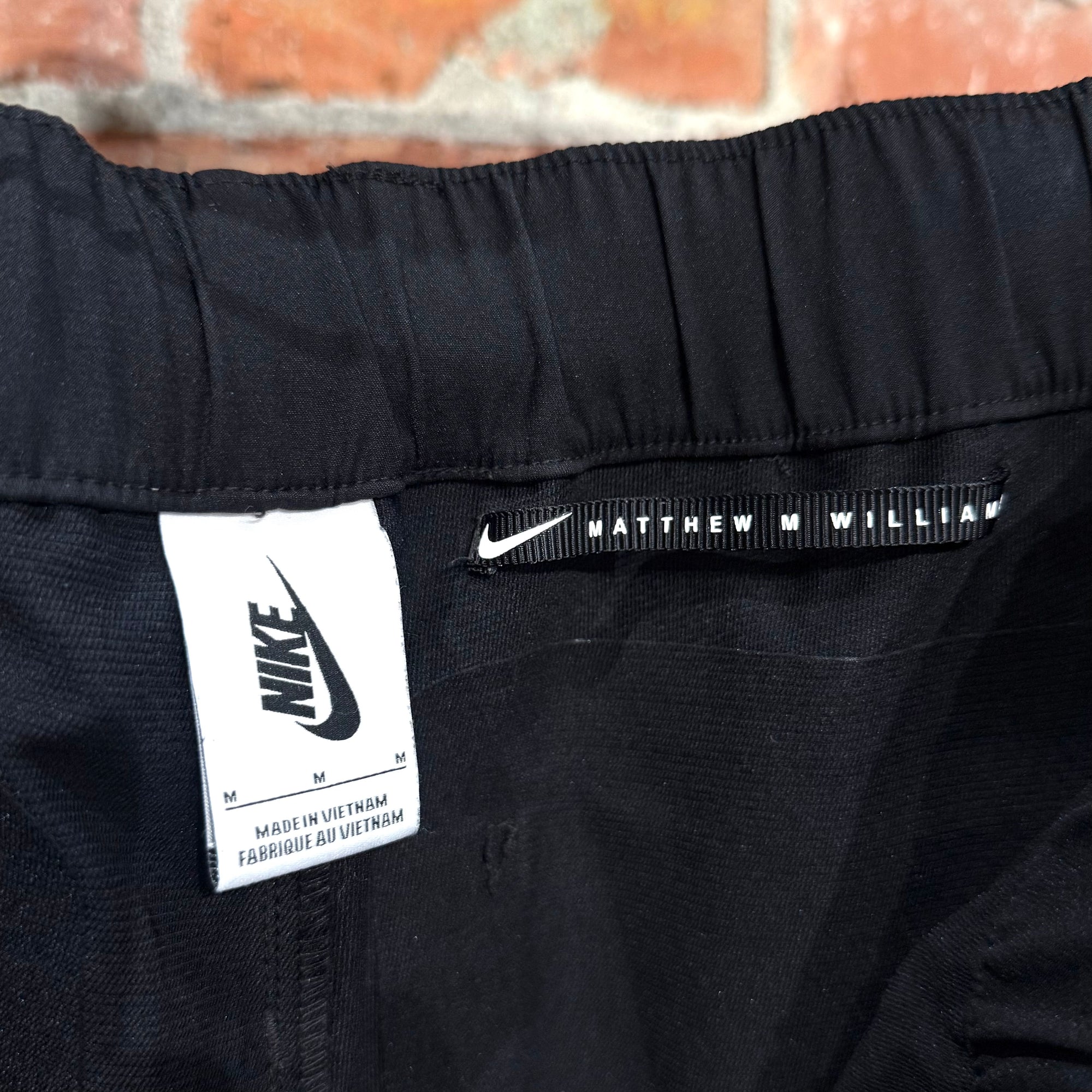 MMW X NIKE CONVERTIBLE TECHWEAR PANTS ‘BLACK’