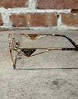 PRADA 59ZV CLEAR FRAME SUNGLASSES ‘WHITEGOLD’