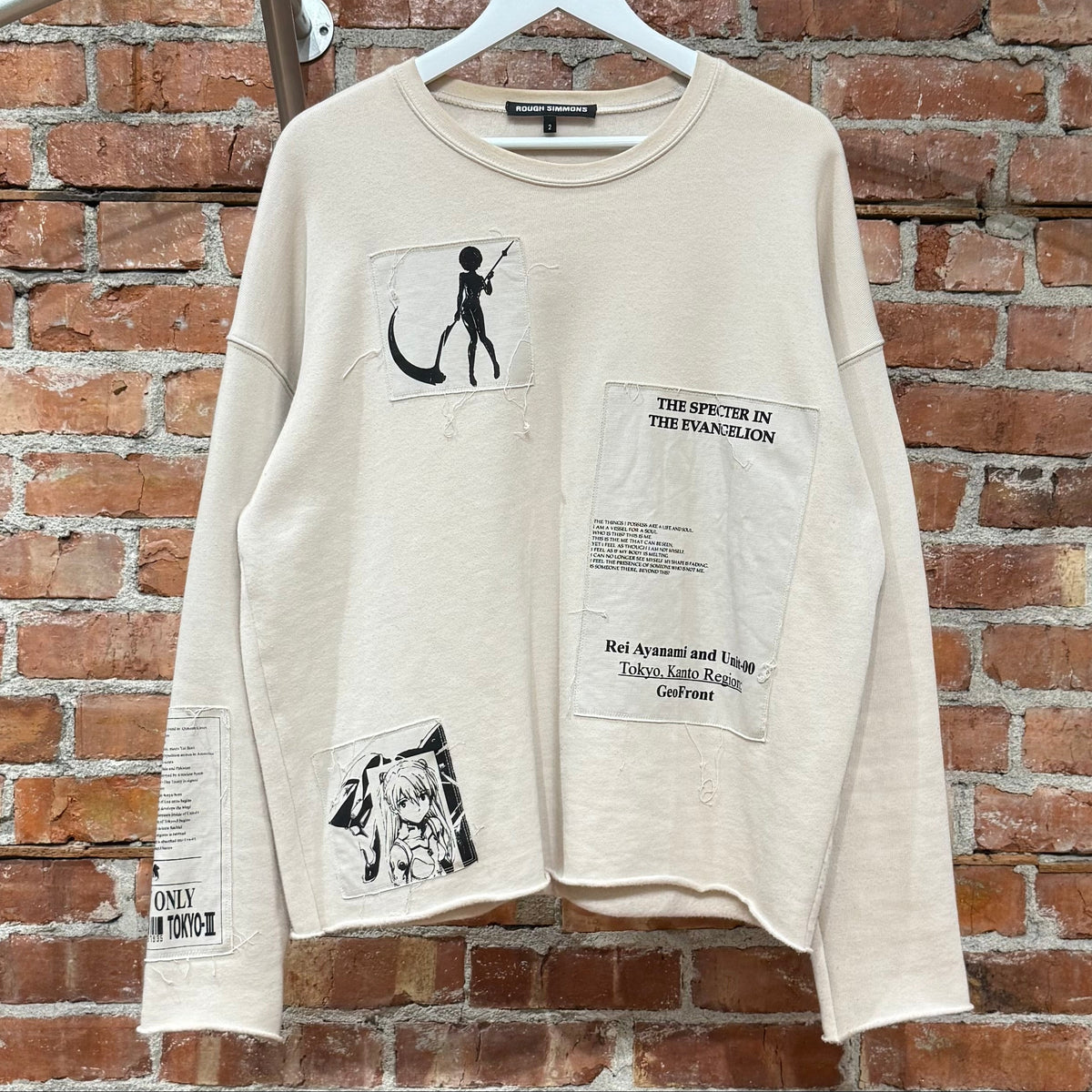 ROUGH SIMMONS EVANGELION PATCHWORK CREWNECK ‘CREAM’