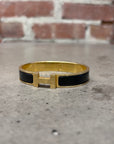 HERMES CLICK BRACELET ‘GOLD/BLACK’