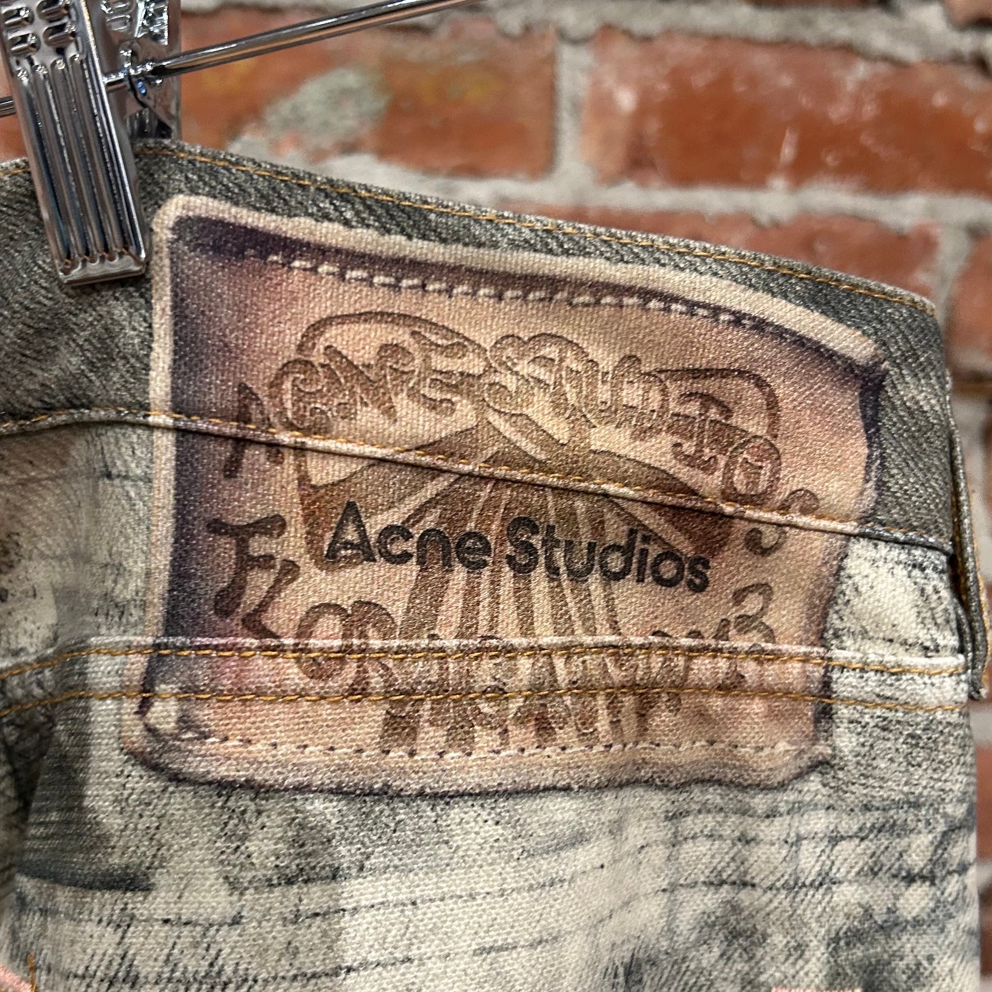 ACNE STUDIOS 1981 TROMPE SPLATTER DENIM ‘STONE’