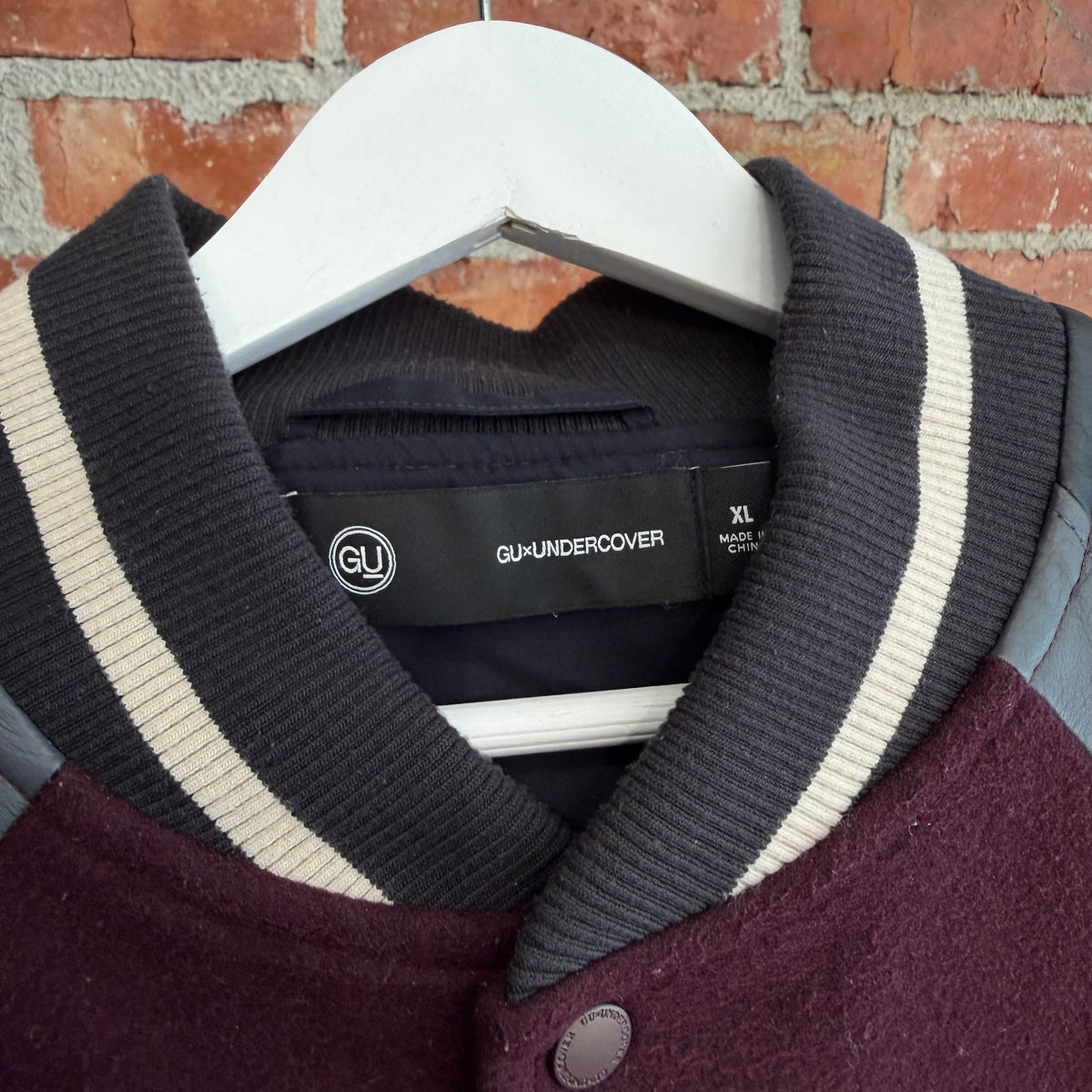 GU X UNDERCOVER KOSMIK NOISE VARSITY JACKET ‘BLACK/MAROON’