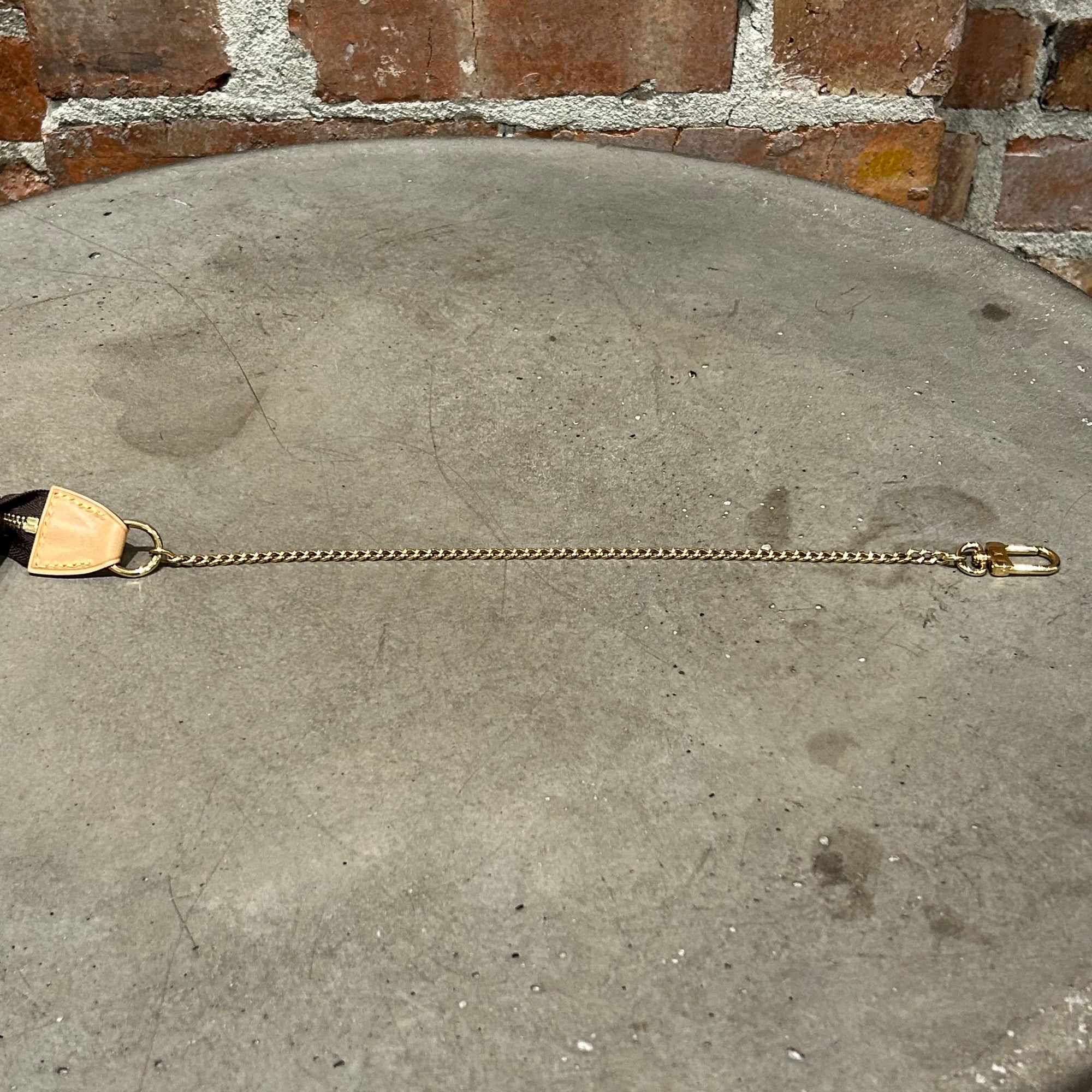 LOUIS VUITTON MONOGRAM POCHETTE BAG ‘BROWN/GOLD’
