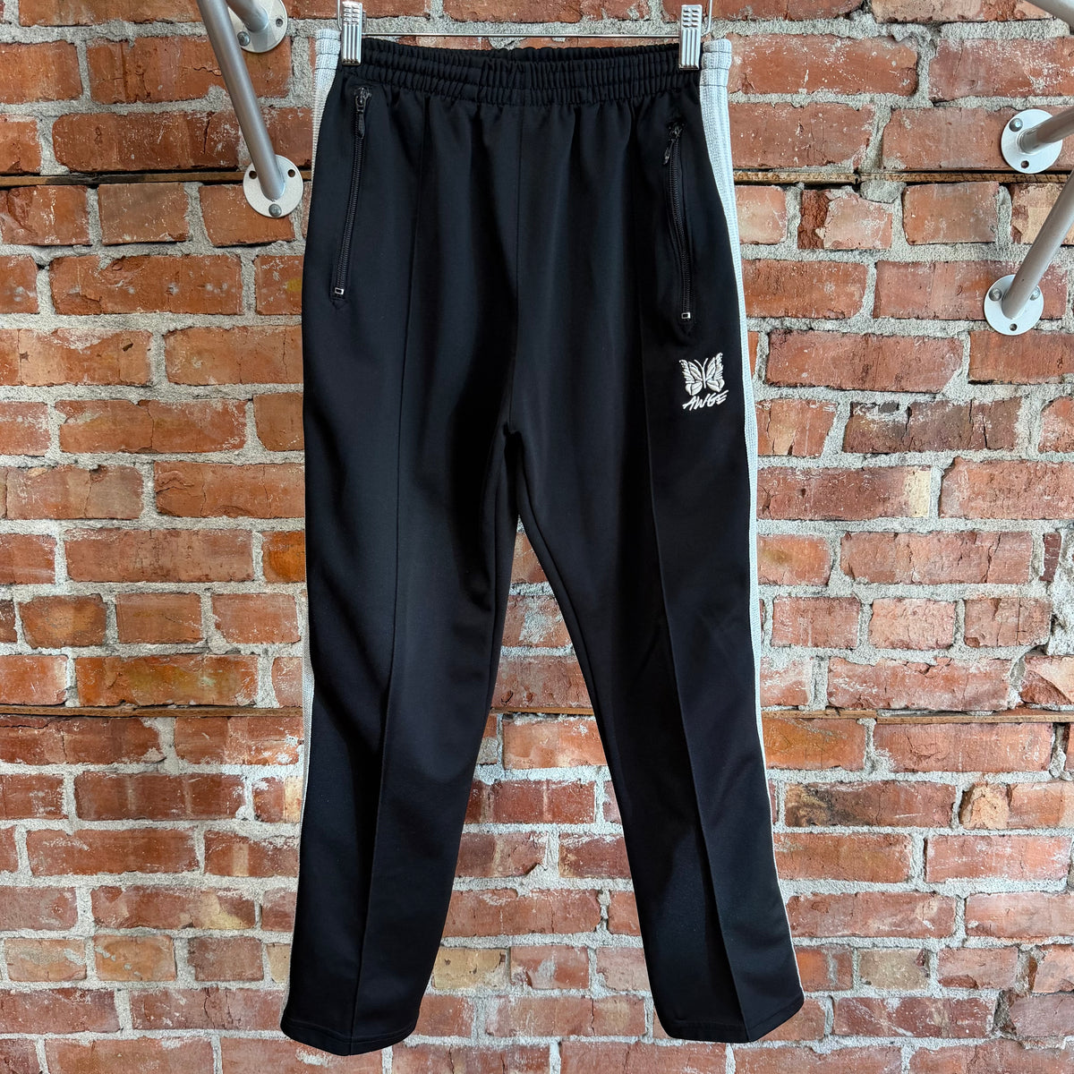 NEEDLES X AWGE TRACK PANTS ‘BLACK/SILVER’