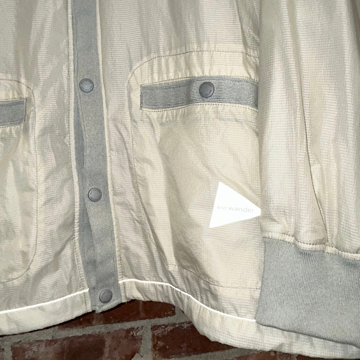 AND WANDER CARDIGAN SHELL JACKET ‘CREAM’