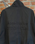 ACNE STUDIOS 1996 STOCKHOLM LOGO BOMBER JACKET ‘BLACK’