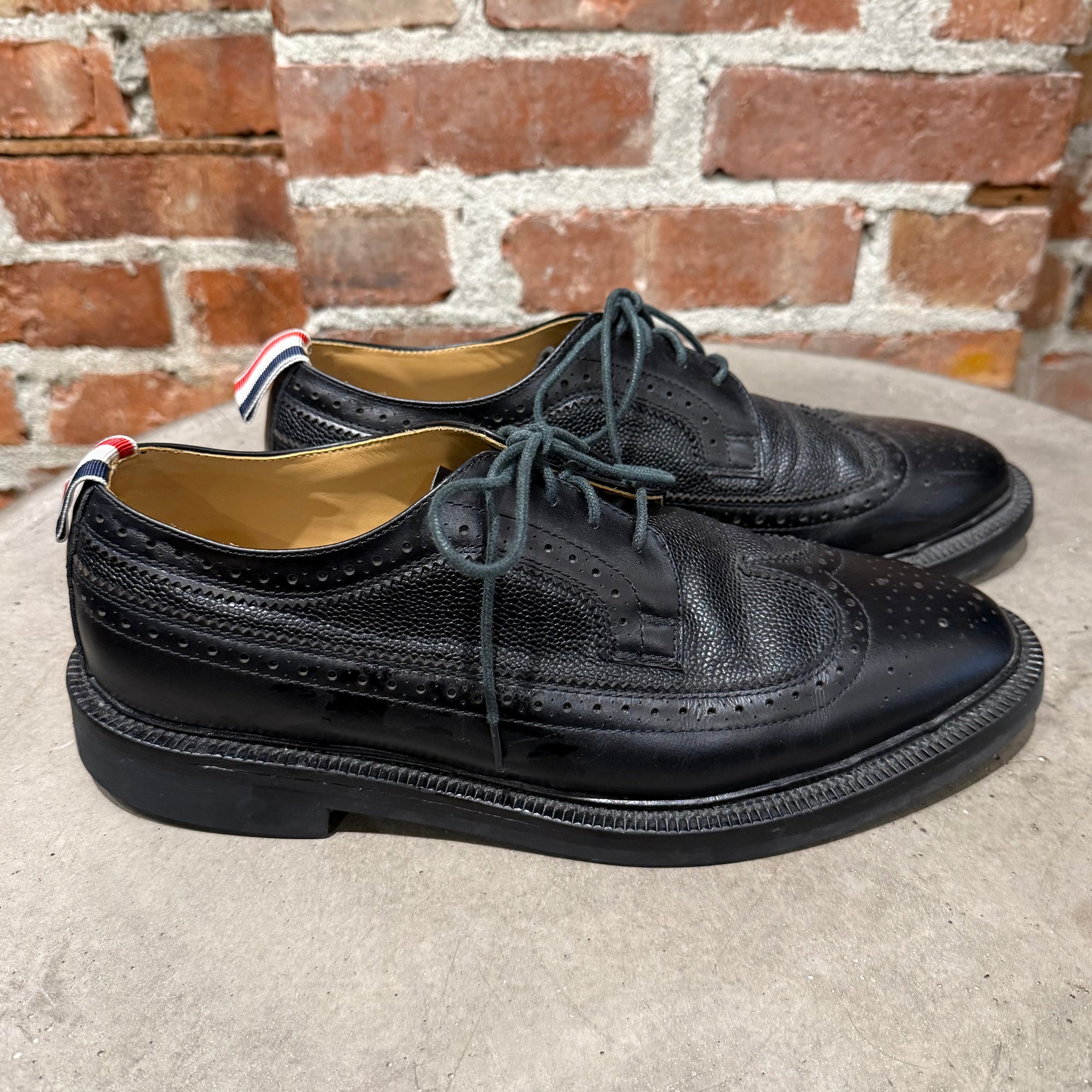 THOM BROWNE PEBBLE-GRAIN LONGWING BROGUES ‘BLACK’