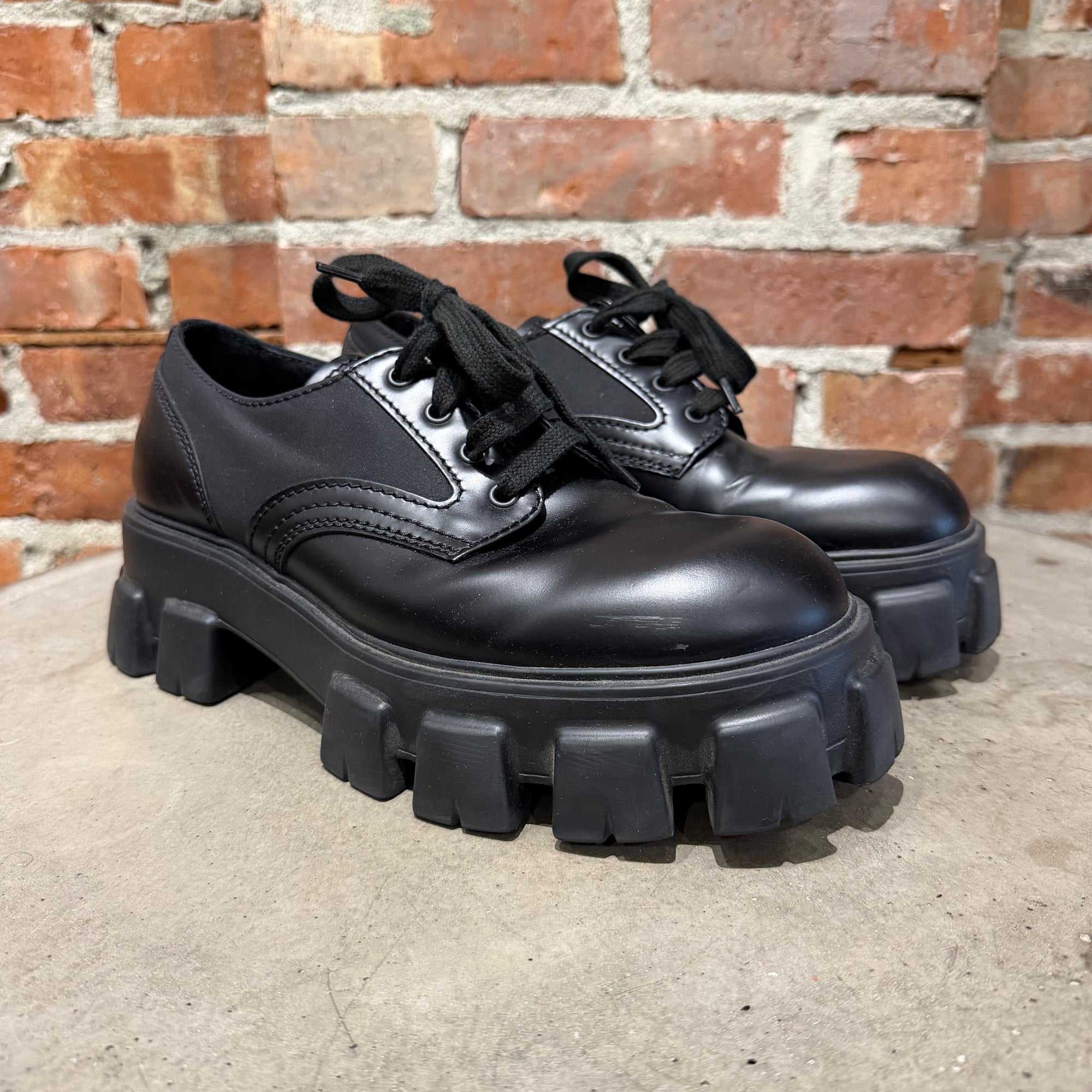 PRADA MONOLITH LEATHER DERBIES ‘BLACK’