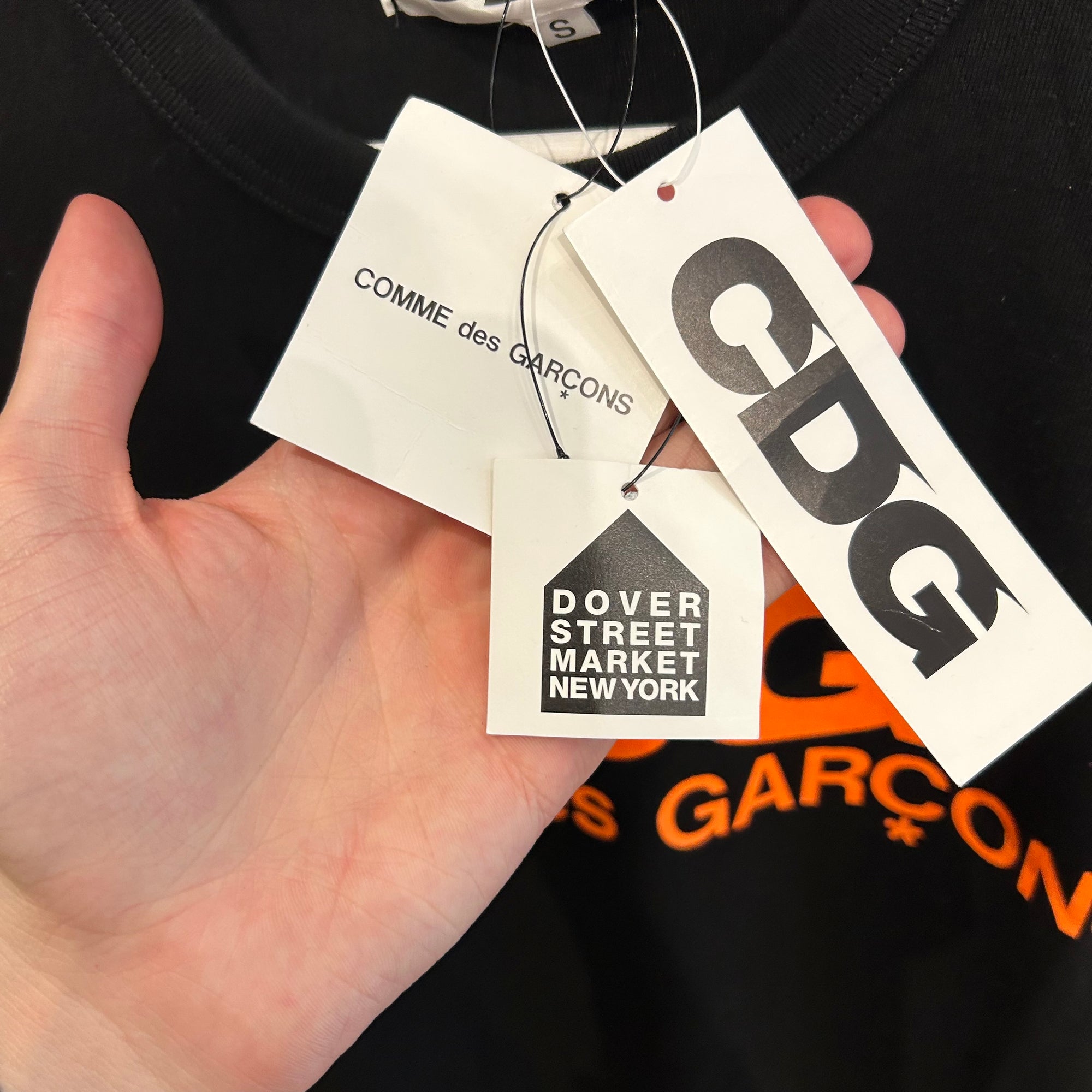COMME DES GARÇONS CDG LOGO TEE ‘BLACK/ORANGE’