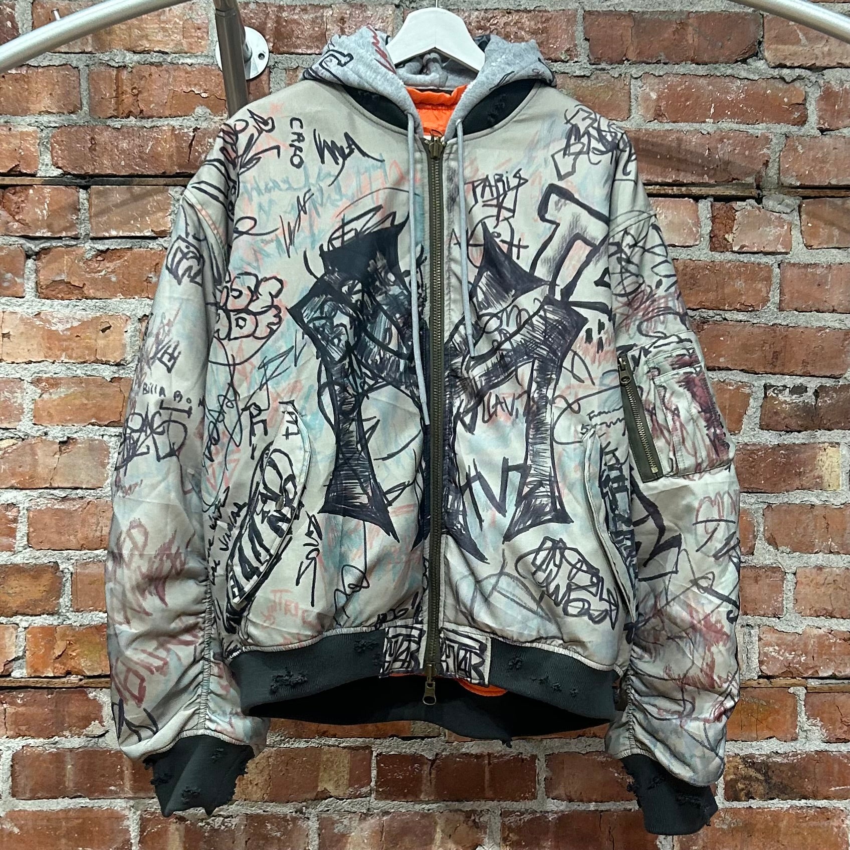 MOWALOLA HYBRID GRAFFITI HOODED BOMBER ‘SAGE’