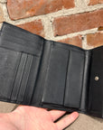 PRADA BADGE SNAP BIFOLD WALLET ‘BLACK’