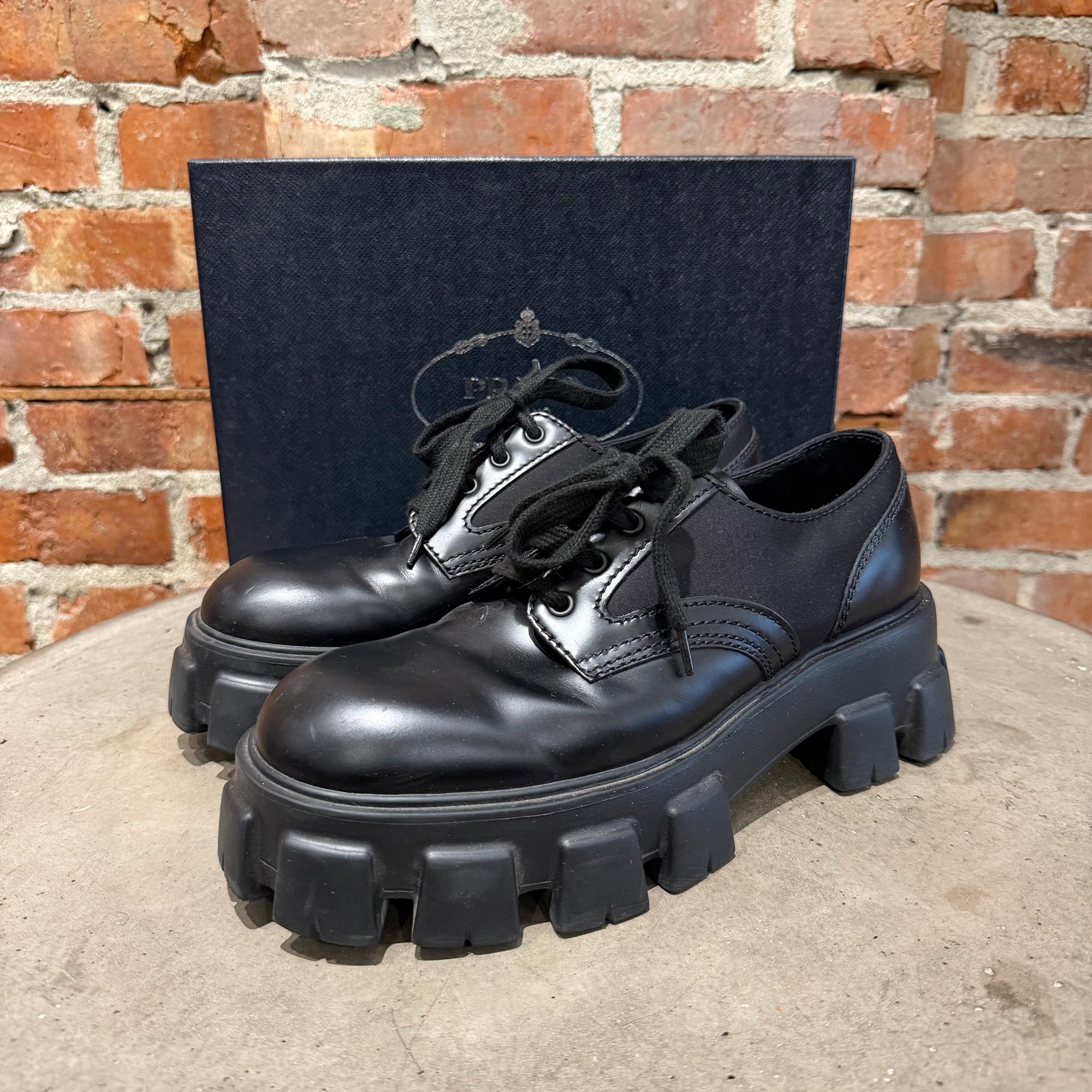 PRADA MONOLITH LEATHER DERBIES ‘BLACK’