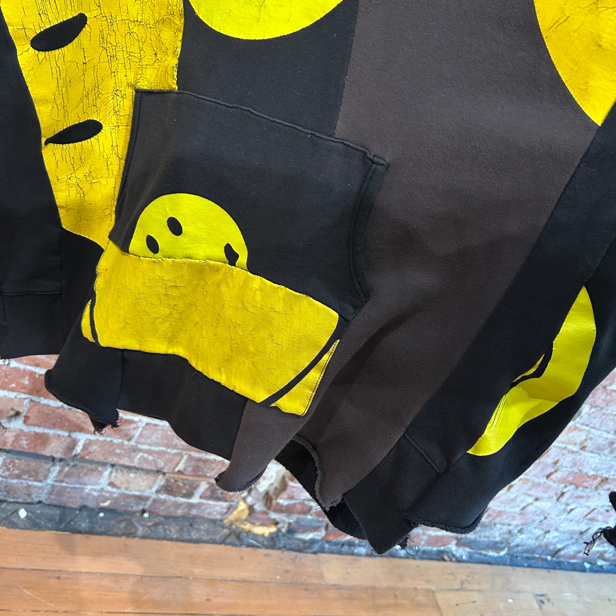 KAPITAL RECONSTRUCTED PATCHWORK SMILEY HOODIE ‘BLACK/YELLOW’