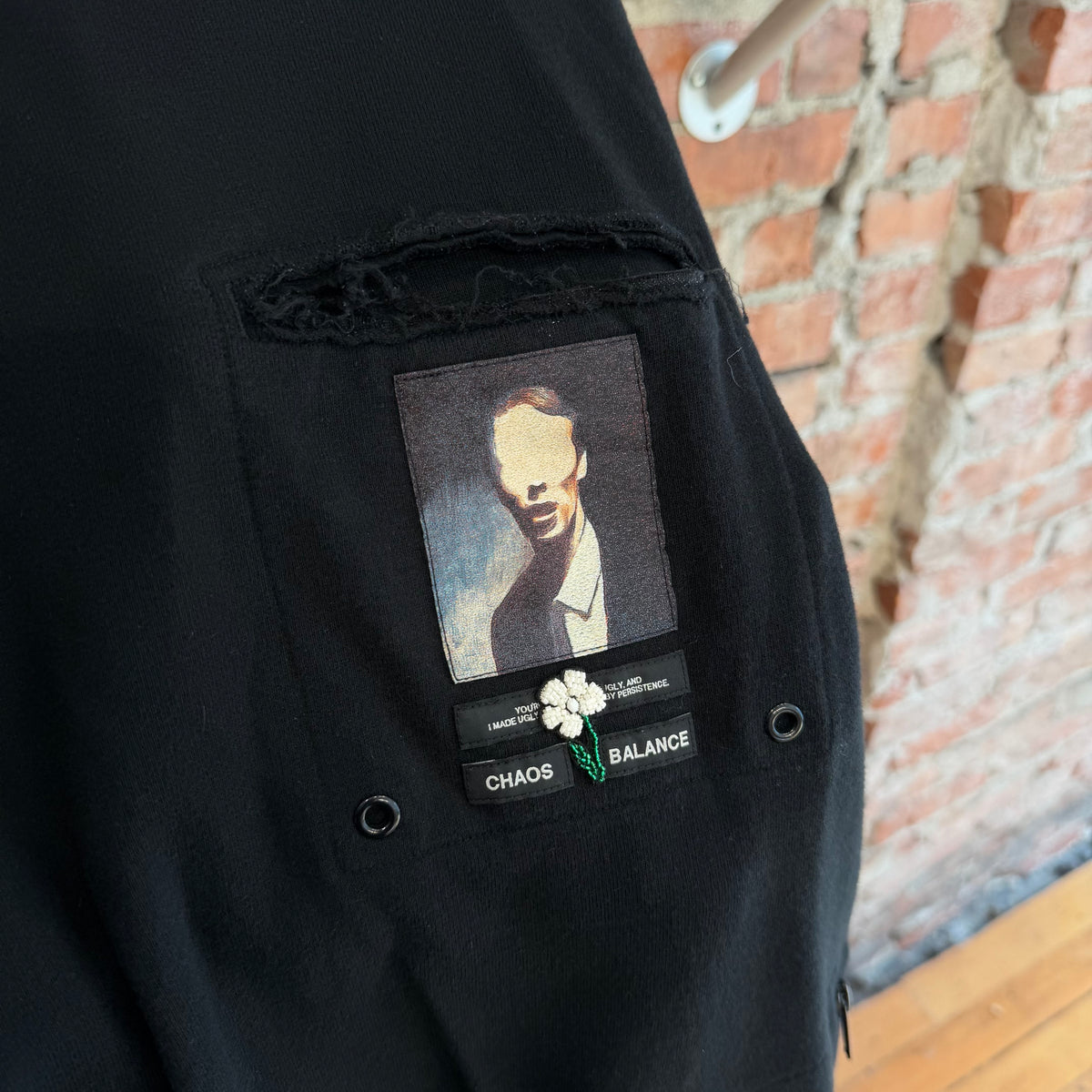 UNDERCOVER SS25 CHAOS BALANCE PATCH LONG SLEEVE ‘BLACK’