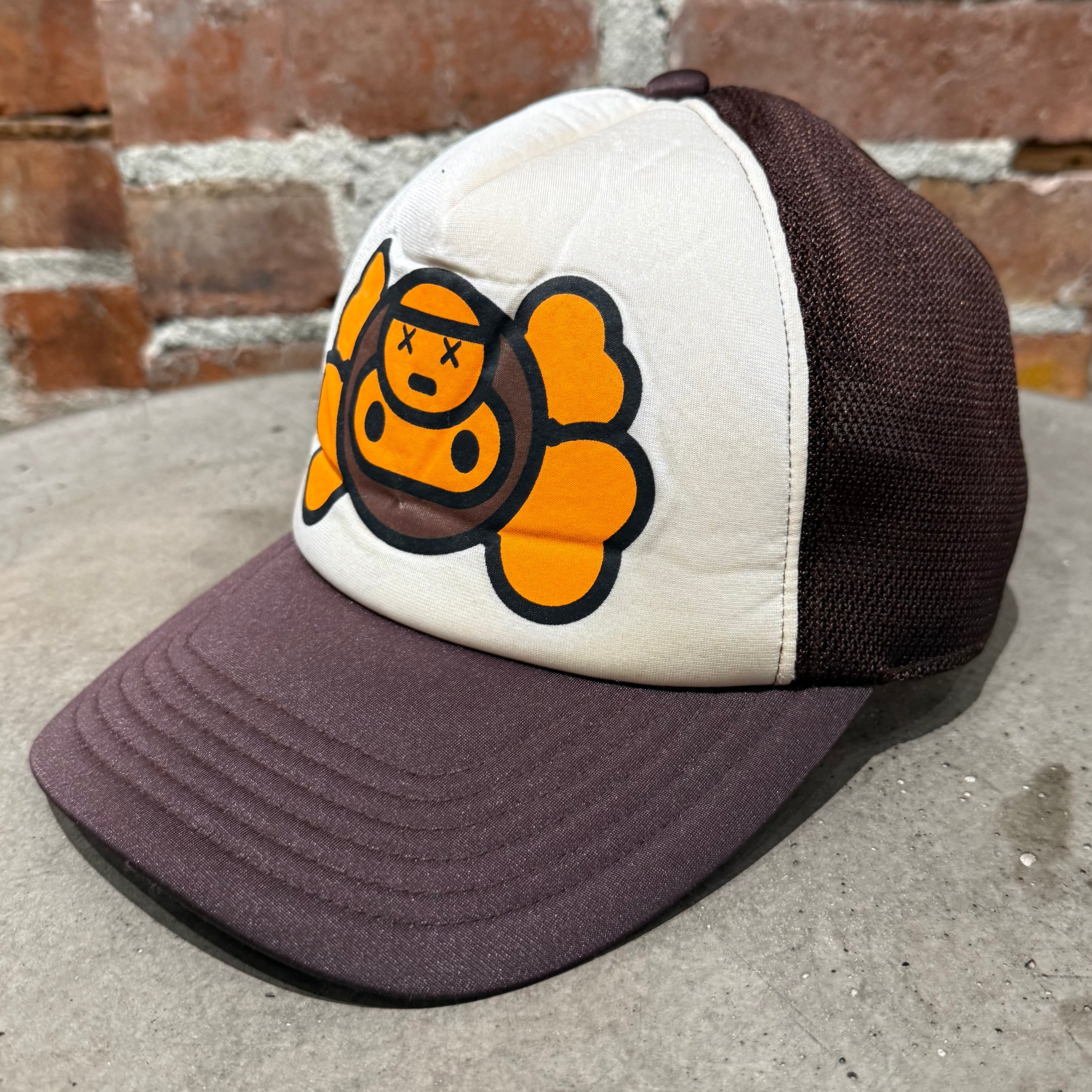 A BATHING APE BAPE スカルボーン　キャップ　Cap KAWS BAPE x KAWS BABY MILO TRUCKER CAP 'BROWN/WHITE' – Sadō Room