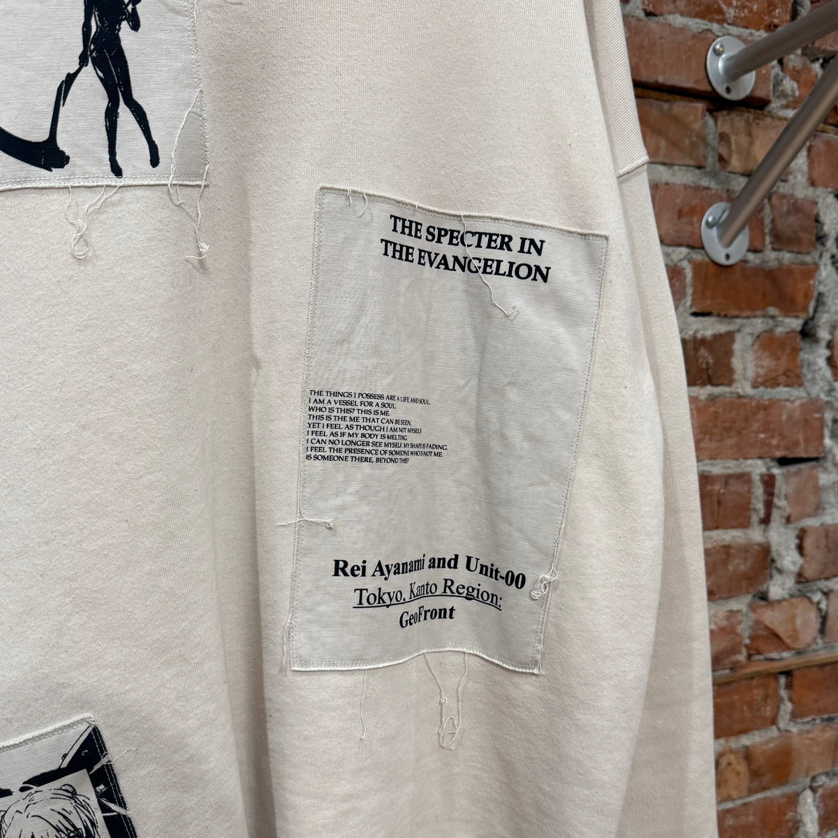 ROUGH SIMMONS EVANGELION PATCHWORK CREWNECK ‘CREAM’