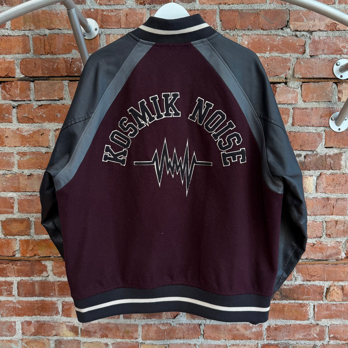 GU X UNDERCOVER KOSMIK NOISE VARSITY JACKET ‘BLACK/MAROON’