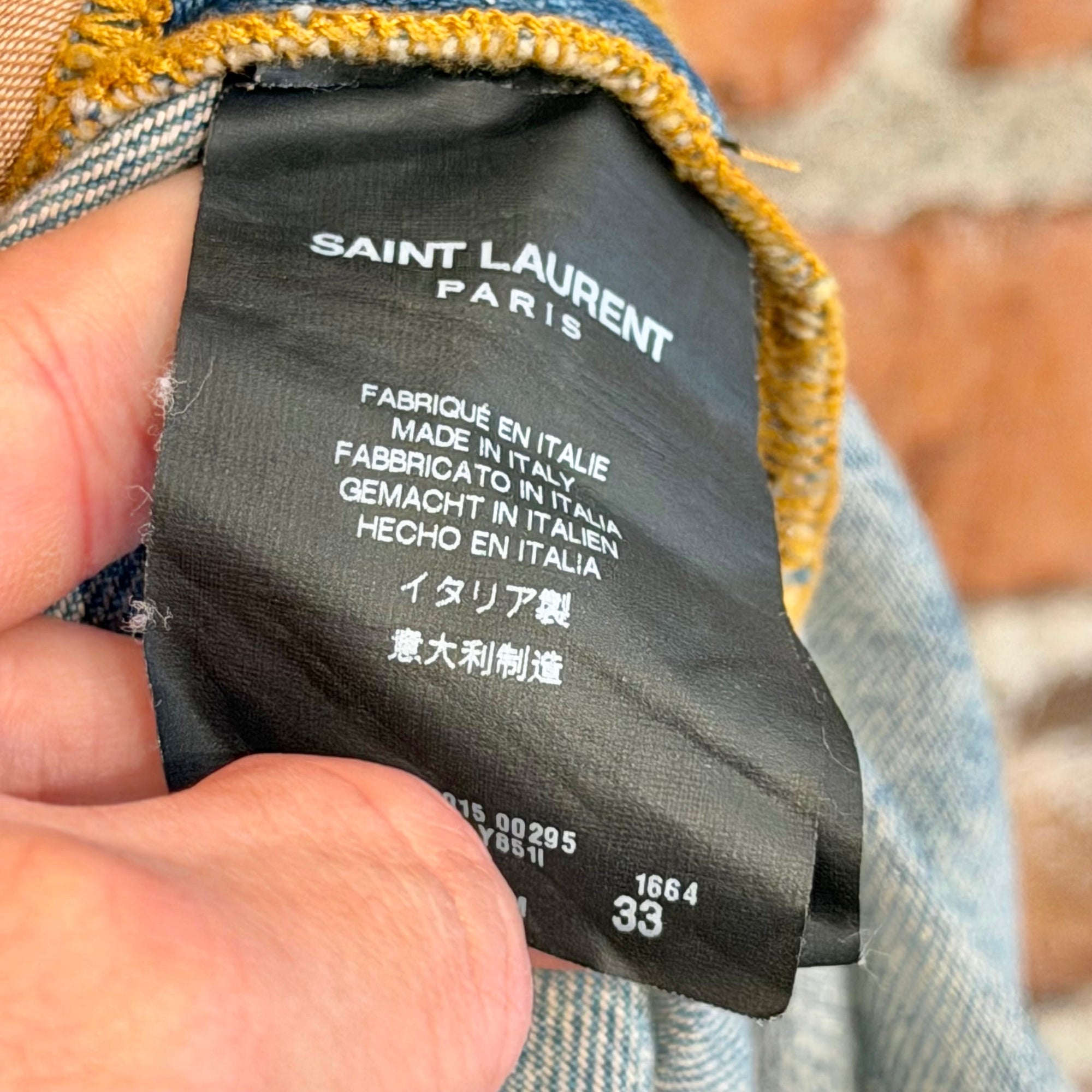 SAINT LAURENT SS15 D02 KNIFE CUT DENIM ‘MUD WASH BLUE’