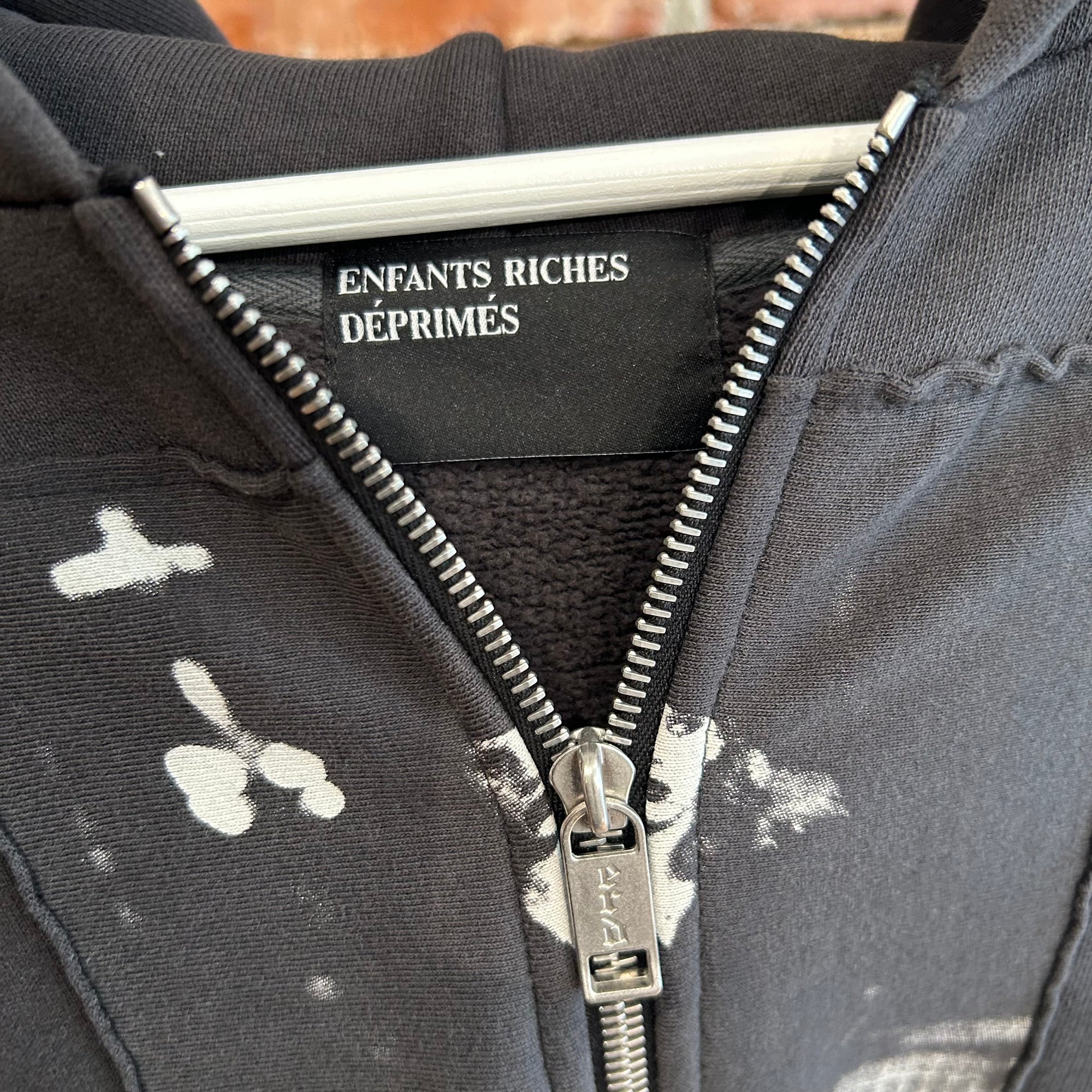 ENFANTS RICHES DEPRIMES SS25 ARTIST DEFENDS ASSEMBLAGE HOODIE ‘BLACK’