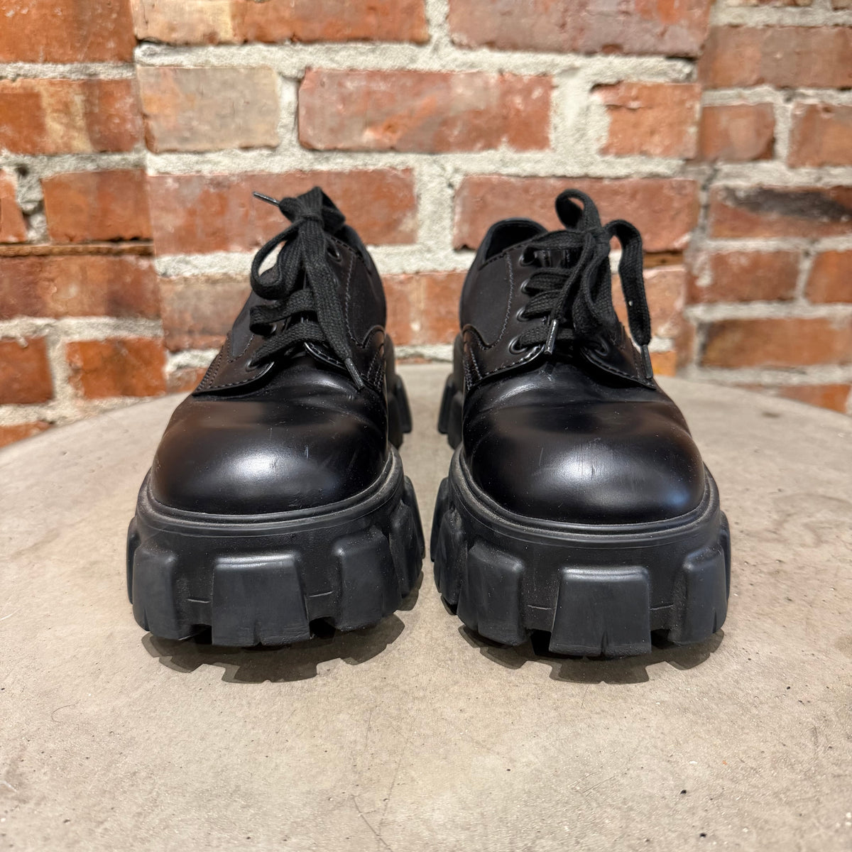PRADA MONOLITH LEATHER DERBIES ‘BLACK’