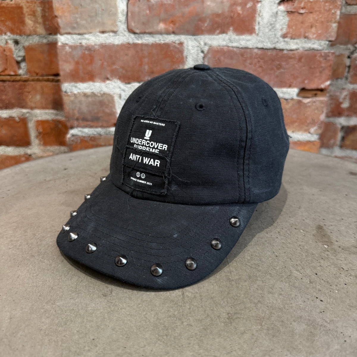 SUPREME SS23 UNDERCOVER STUDDED HAT ‘BLACK’