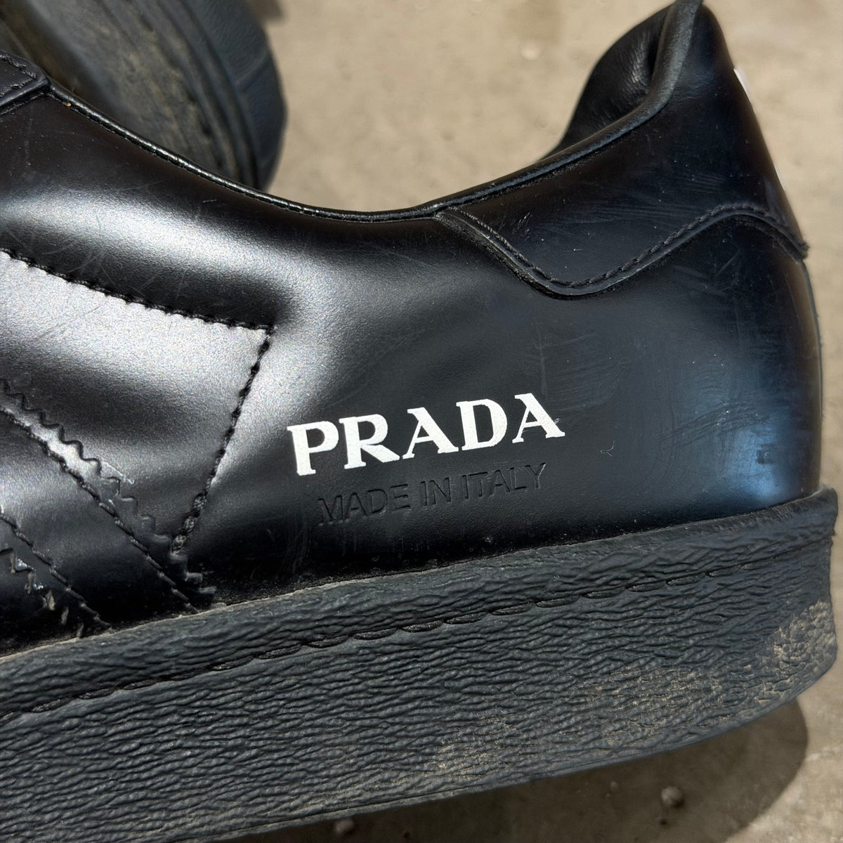 ADIDAS X PRADA MILANO LEATHER SUPERSTAR SNEAKERS ‘BLACK’