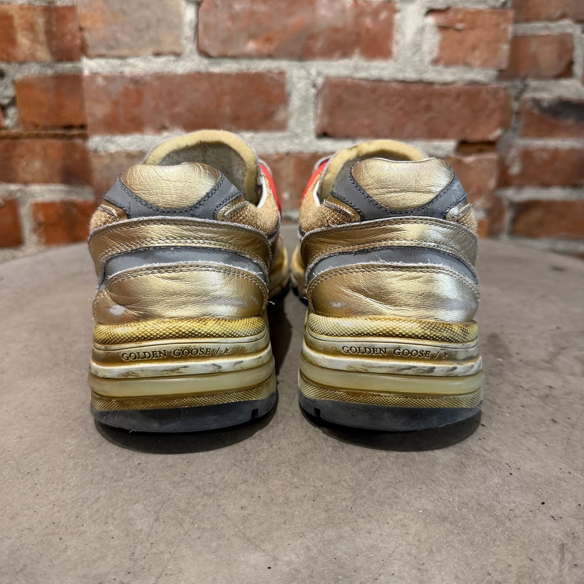 GOLDEN GOOSE DELUXE DAD-STAR SNEAKERS ‘GOLD’