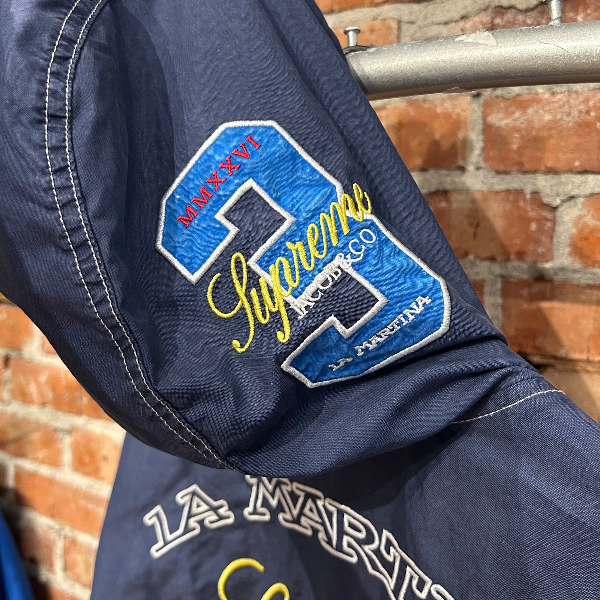 SUPREME X JACOB &amp; CO X LA MARTINA SS26 HOODED JACKET ‘NAVY’