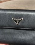 PRADA BADGE SNAP BIFOLD WALLET ‘BLACK’