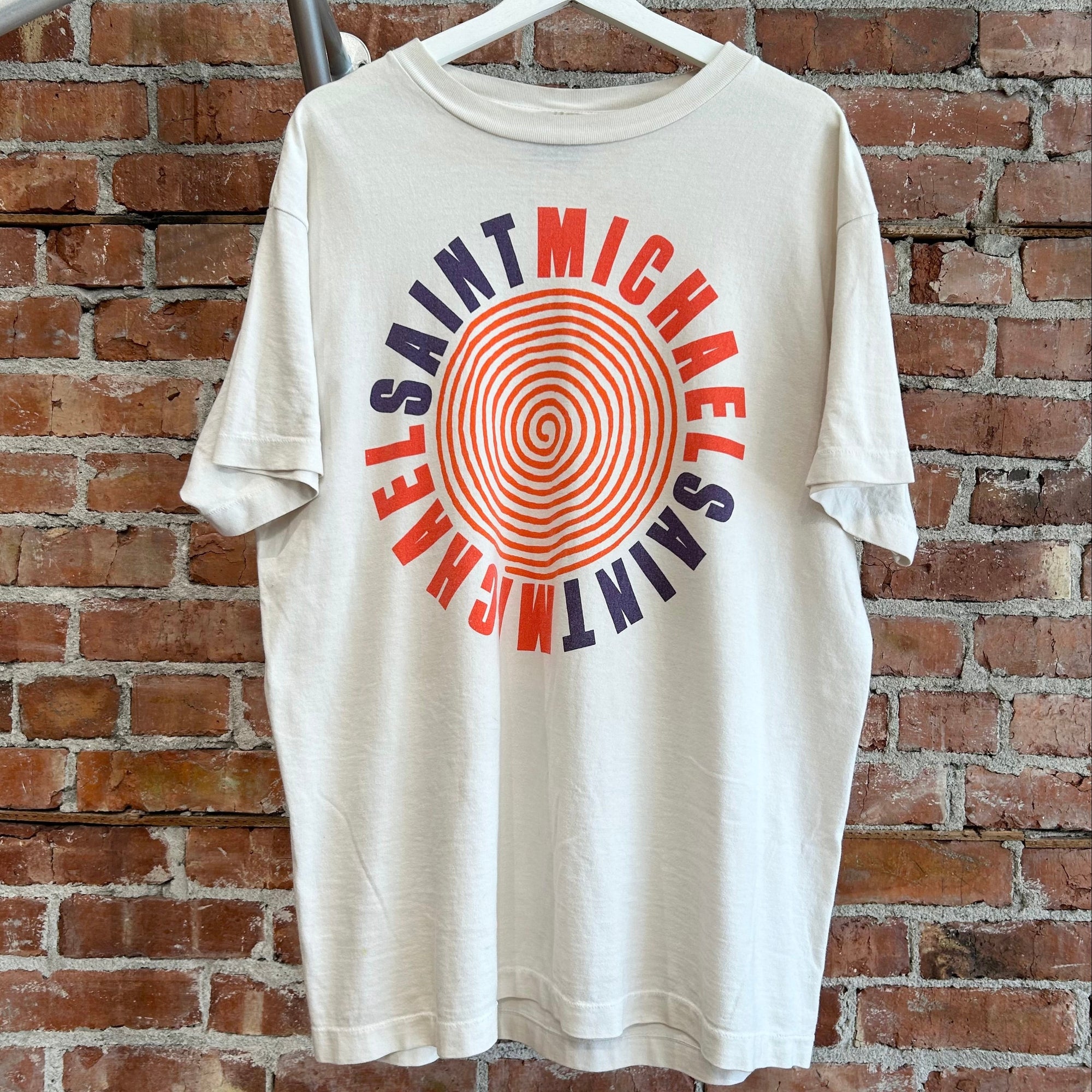 SAINT MICHAEL SPIRAL CIRCLE GRAPHIC TEE ‘MULTI’
