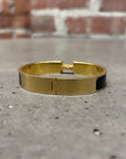 HERMES CLICK BRACELET ‘GOLD/BLACK’